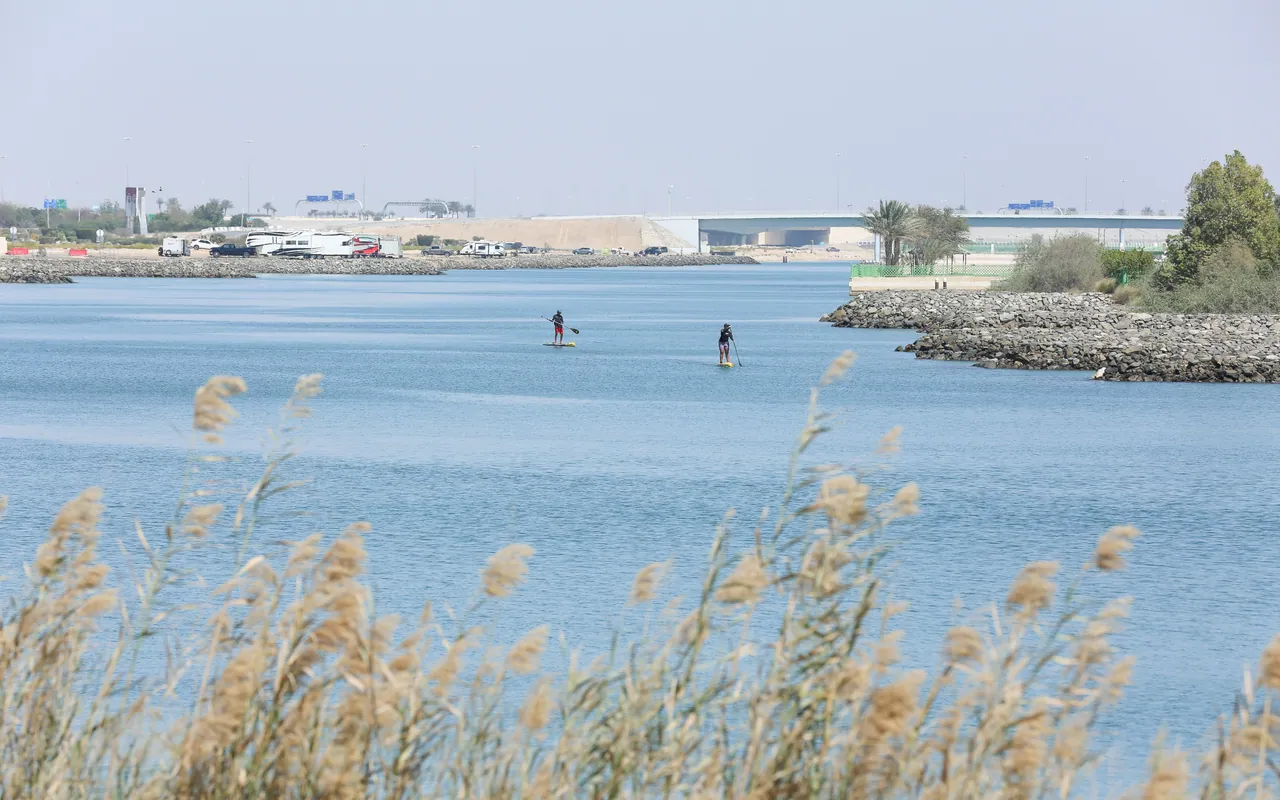 Paddleboarders on the water at Yas Island