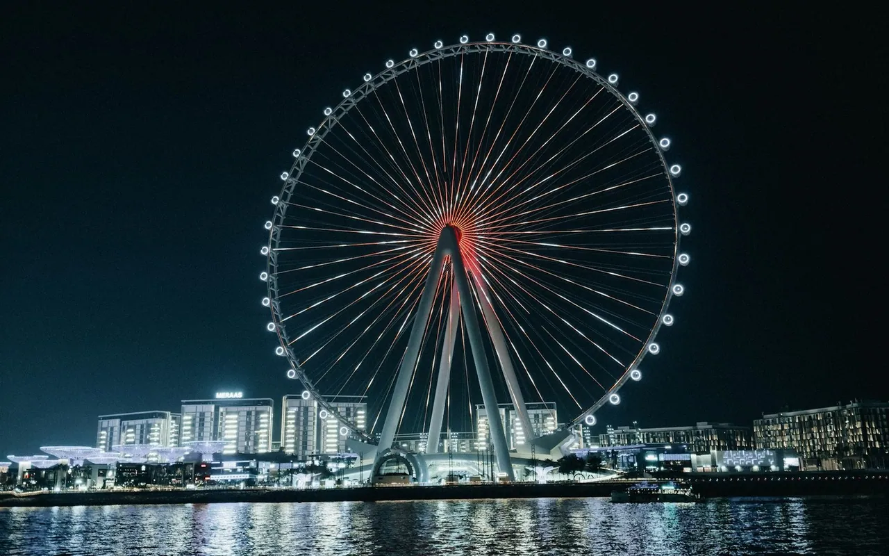 Ain Dubai illuminated above the Bluewaters Island waterfront