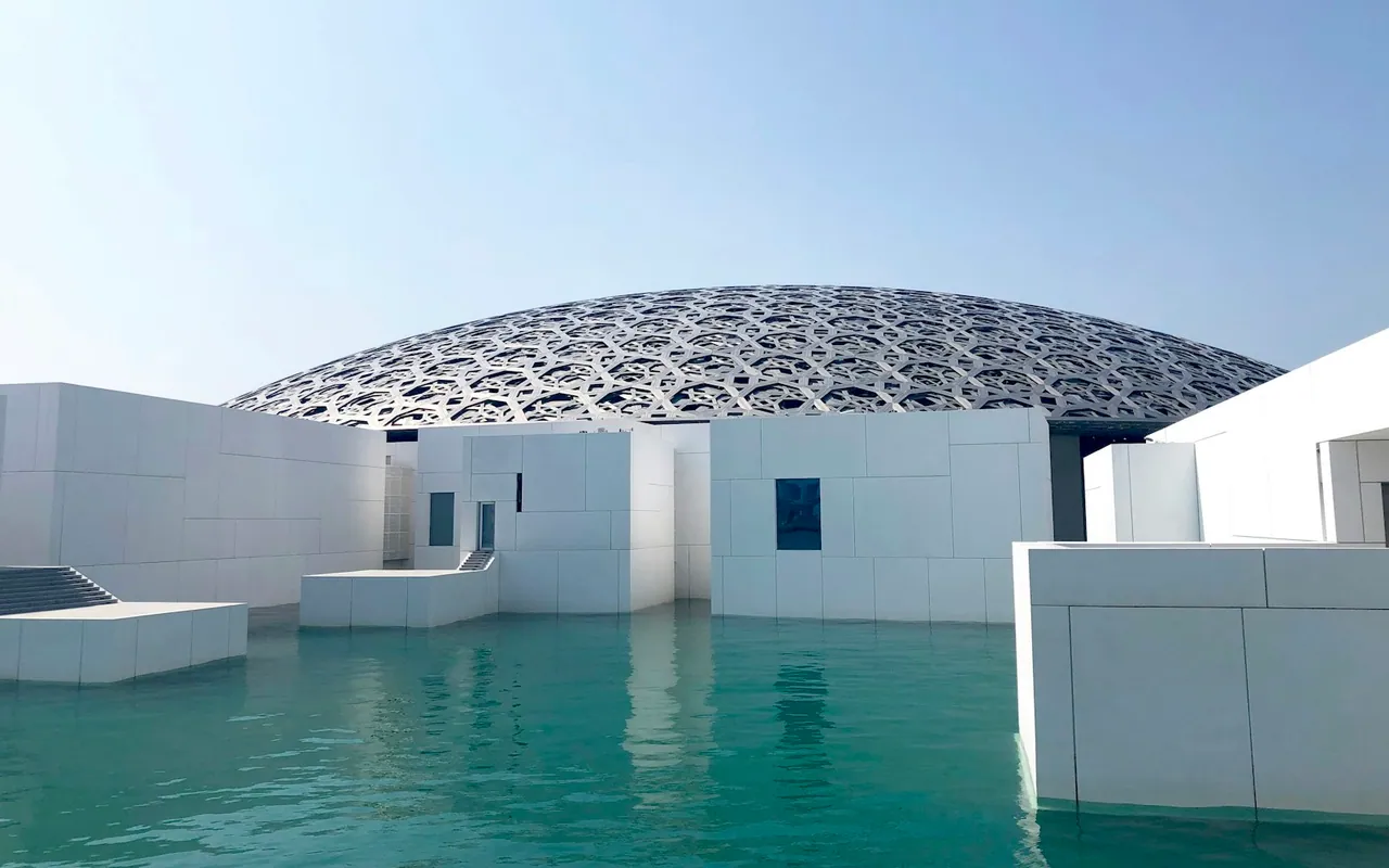 Louvre Abu Dhabi dome and turquoise water on Saadiyat Island
