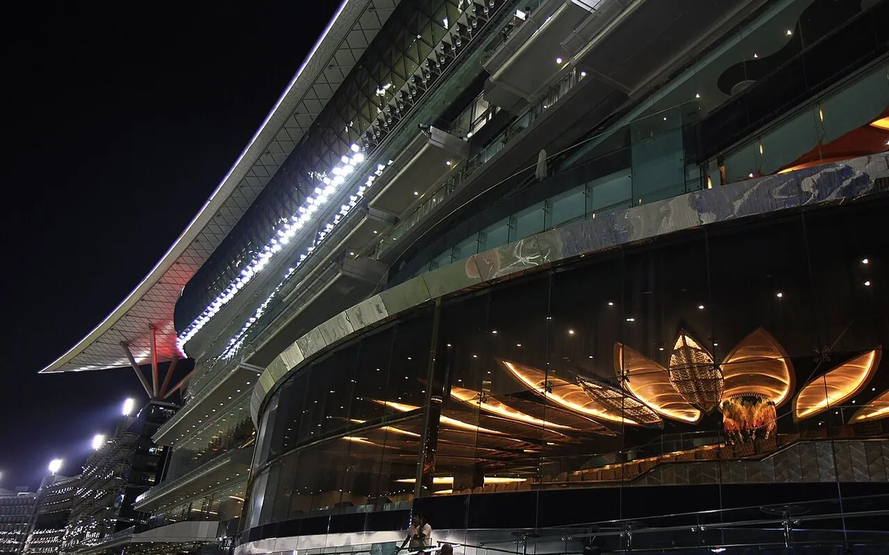 Illuminated Meydan Racecourse grandstand and entrance
