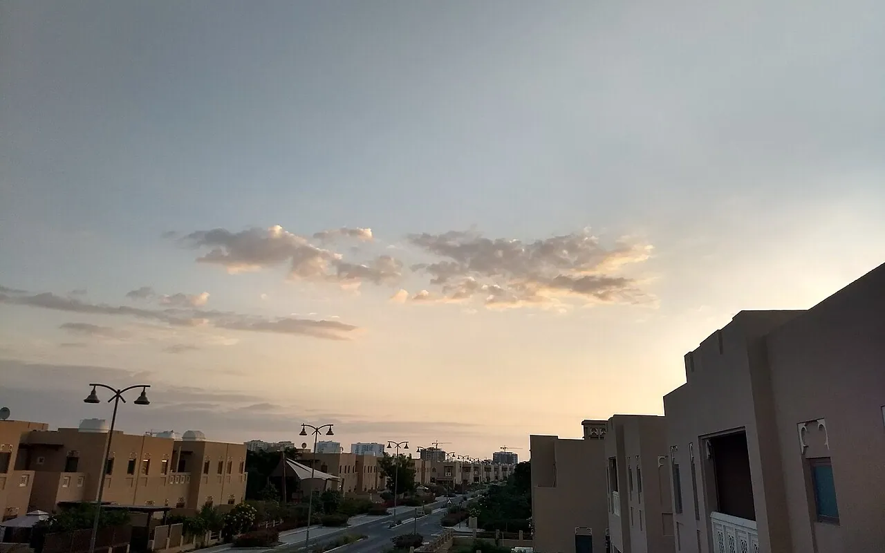 Residential villas and a quiet street at sunrise in Al Furjan, Dubai