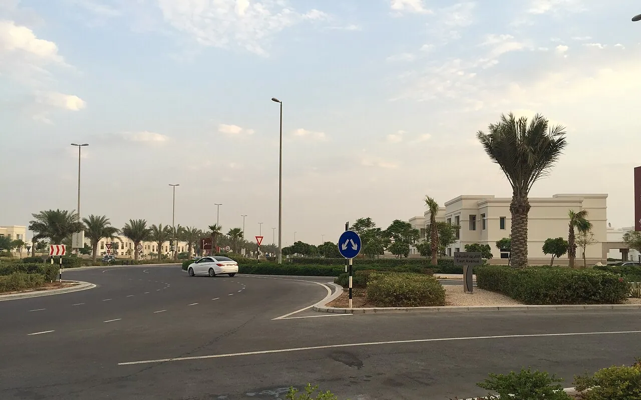 Representative Abu Dhabi community photograph: villas and a landscaped street in Al Ghadeer