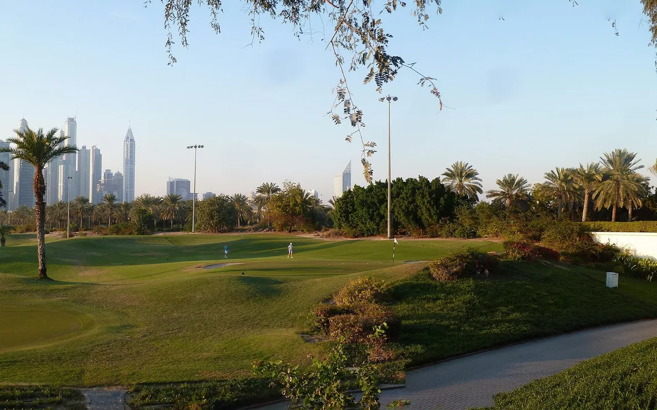Golf fairway, palms and landscaping in Emirates Hills