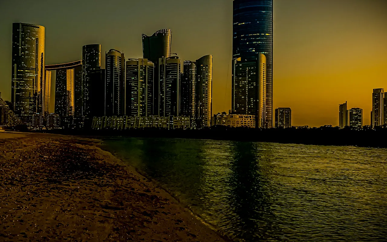 Gate Towers and Al Reem Island skyline at sunset from Al Reem Central Park