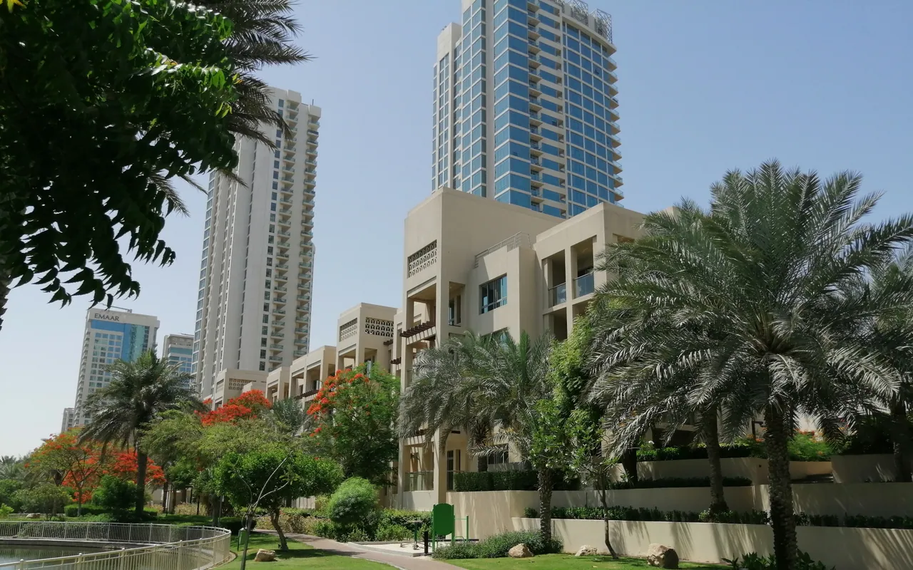 Landscaped gardens and residential towers in The Greens, Dubai