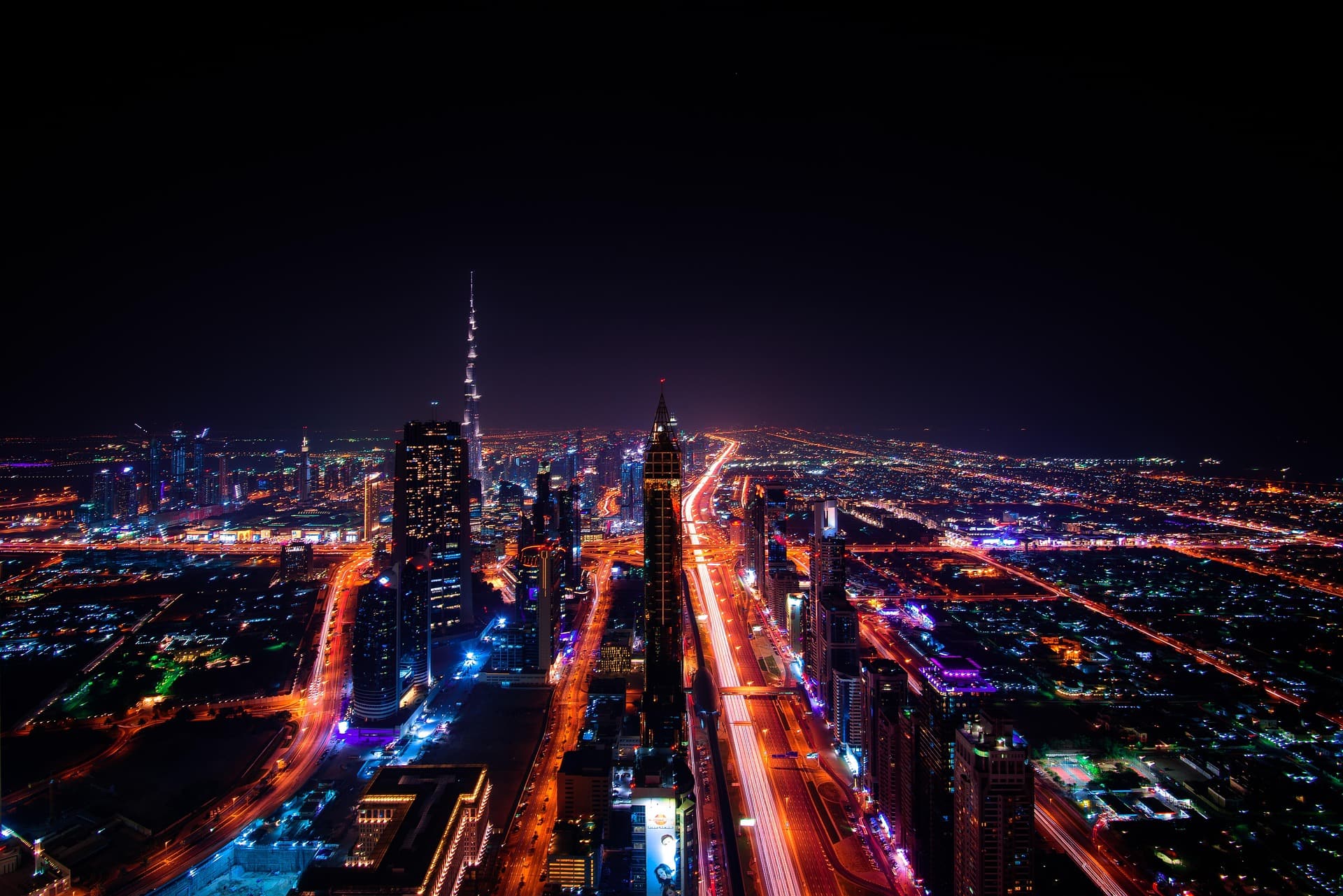 Downtown Dubai and Burj Khalifa at night, seen from above