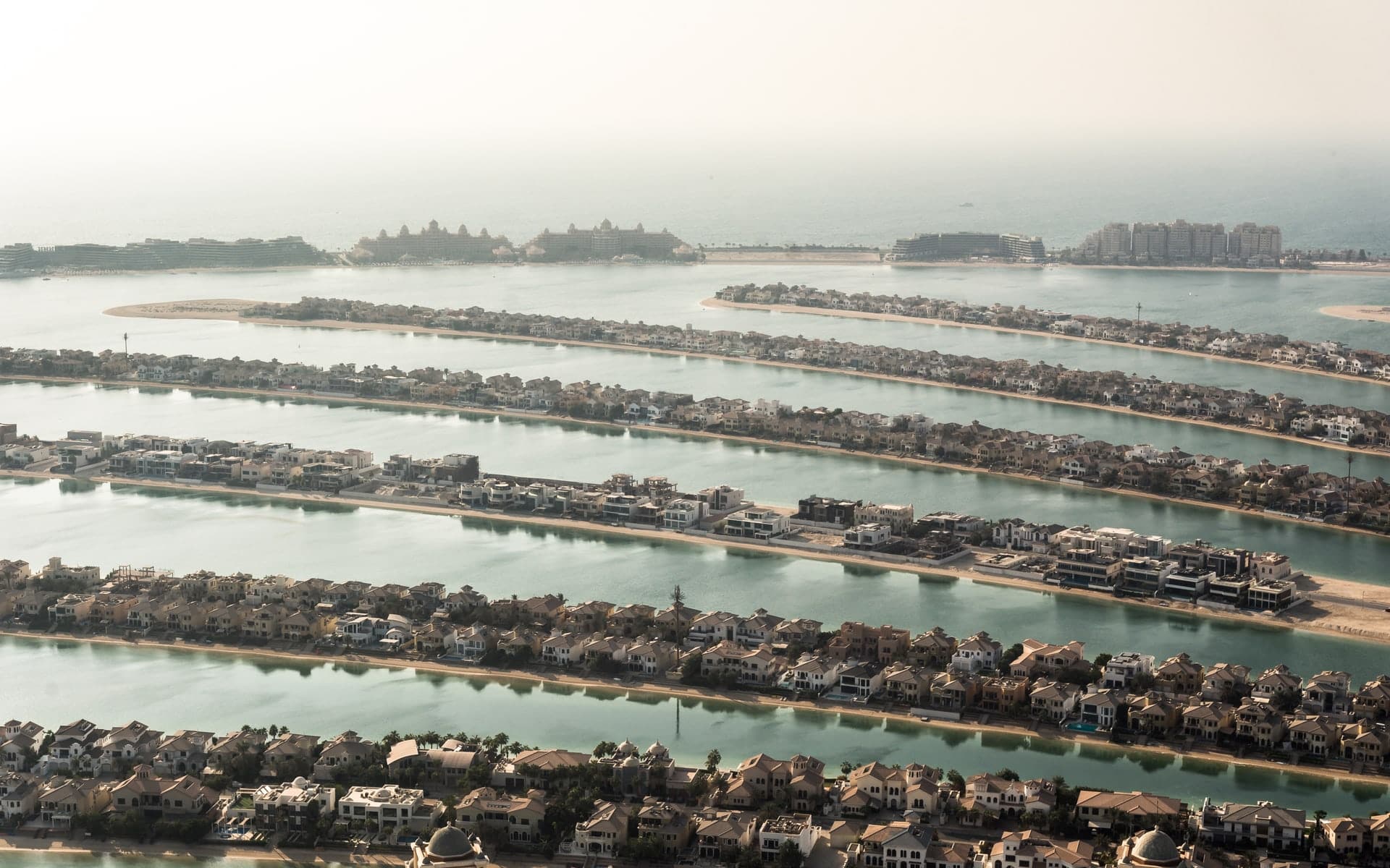 Villas along the fronds of Palm Jumeirah, seen from above